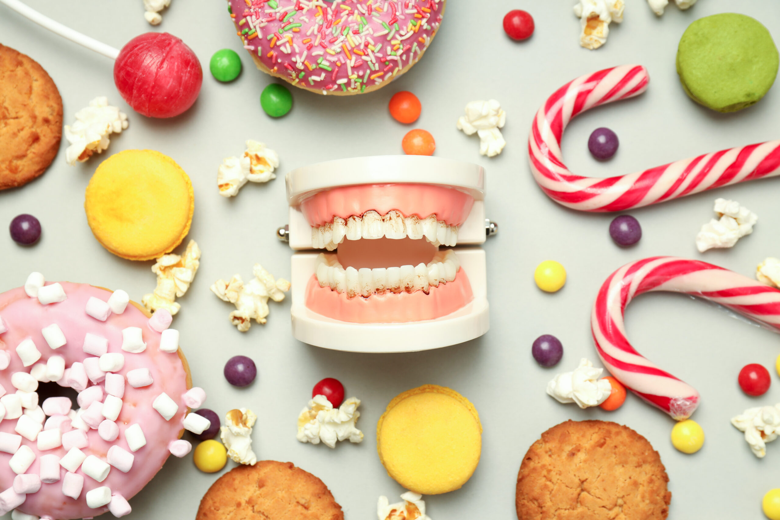 Prevent Dentures from sugary foods with the help of our dentist in Duxbury
